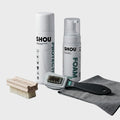 Kit specializat SHOU Suede Care Kit format dintr-un spray aerosol impermeabilizant SHOU Protect de 250ml, flacon de spuma activa de 150ml, o perie speciala pentru piele intoarsa, o perie moale Shou Low din lemn si o laveta gri pliata